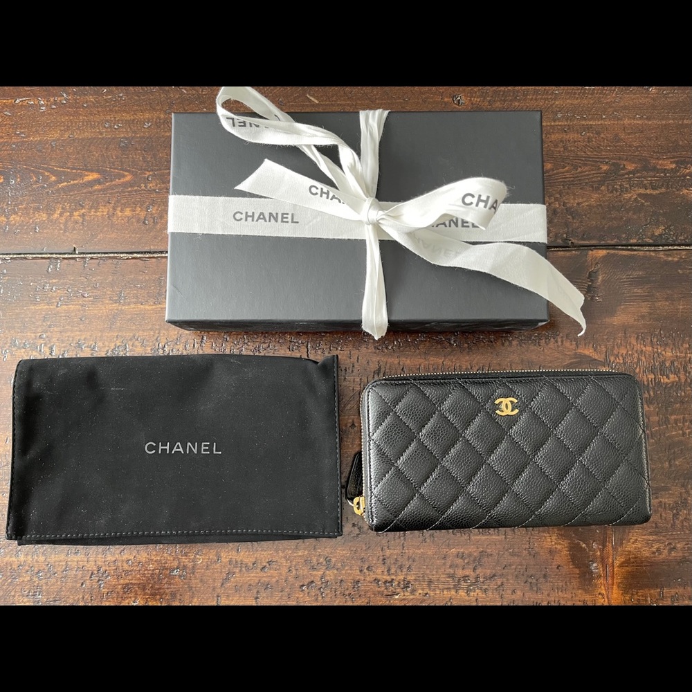 Authentic Chanel caviar quilted zip around wallet